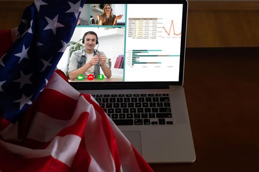 laptop with video chat, flag of the usa.