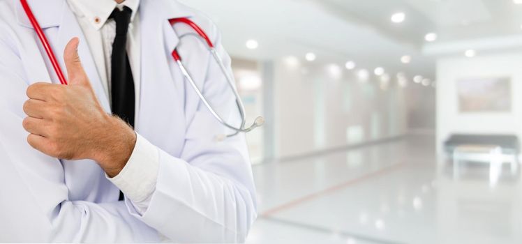 Young male doctor working at the hospital. Medical healthcare and doctor staff service.