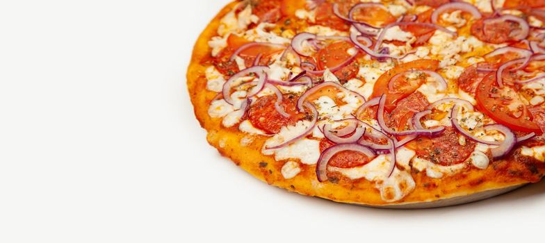 Delicious Rustic pizza. Signature sauce, mozzarella cheese, pepperoni, chicken fillet, tomatoes, red onion. Close-up. Advertising flyer and poster for restaurants. With copy space for text