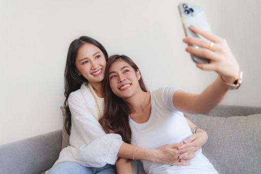 Young Asian Women LGBT lesbian couple love moments happiness at bedroom. LGBTQ or Gay and pride concpet