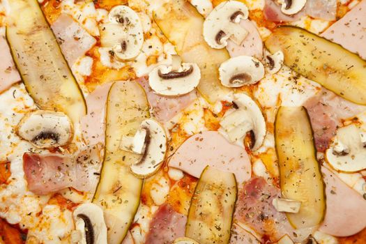 The texture of a delicious meat pizza served on a wooden plate, the ingredients are the signature sauce, mozzarella cheese, ham, bacon, pickled cucumber, champignons on white. Pizzeria promotion poster.