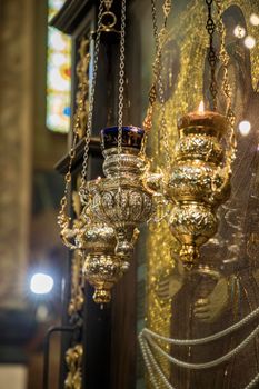 Beautiful censers hanging above the large icon in the Church