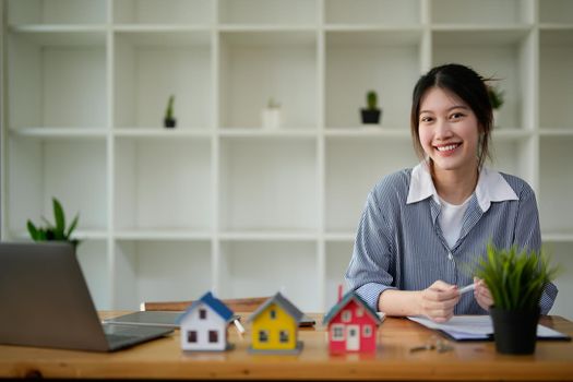 Portrait real estate agent working with contract agreement on workplace.