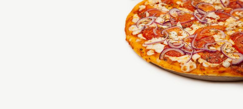 Delicious Rustic pizza. Signature sauce, mozzarella cheese, pepperoni, chicken fillet, tomatoes, red onion. Close-up. Advertising flyer and poster for restaurants. With copy space for text