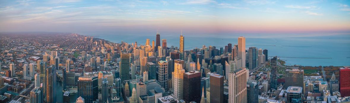 Aerial view of Chicago downtown at sunset from high above.

