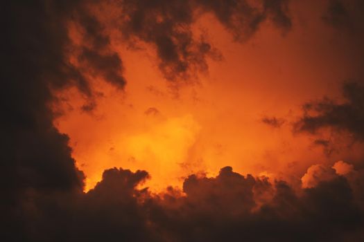 Beautiful red clouds in the sky. Beautiful summer sunset. High quality photo