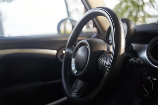 The steering wheel in the car. Torpedo in the car. High-quality photo