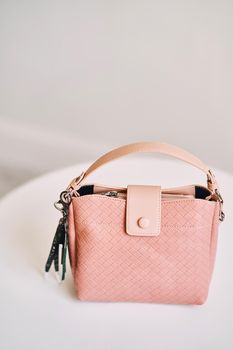 Pink women bag on sale in store. High quality photo