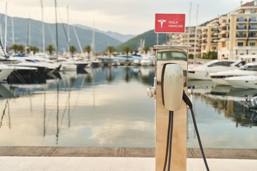 Tivat, Montenegro - May 28, 2021: Charging for Tesla electric vehicles. Tesla charging stations.