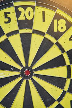 Darts game. round dartboard. Dart arrow hitting in the target center of the dartboard. Marketing concept.