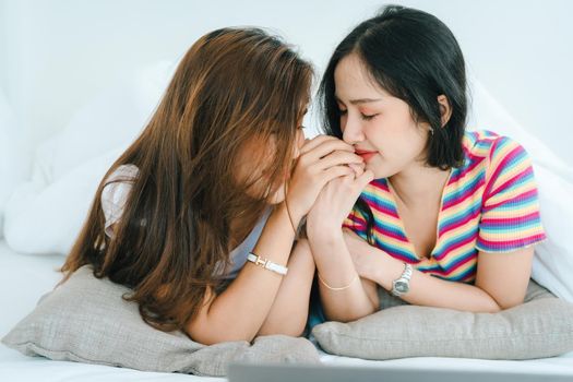 lgbtq, lgbt concept, homosexuality, portrait of two Asian women posing happy together and showing love for each other while being together.