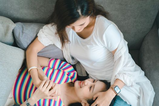 lgbtq, lgbt concept, homosexuality, portrait of two Asian women posing happy together and showing love for each other while being together.