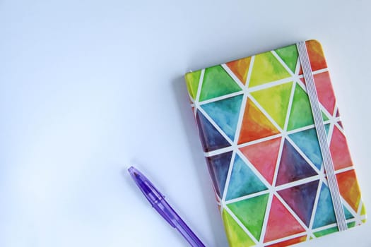 Back to school concept, school supplies, top view of colorful pastel notebooks and pencils on white background banner