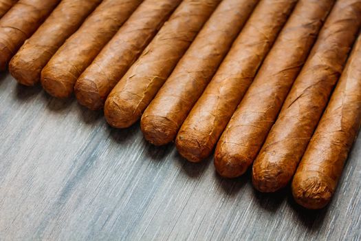 Cigars on the wooden background