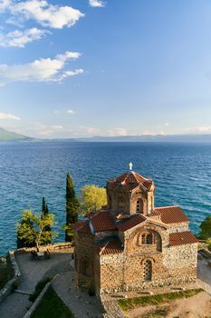 Church of St. John the Theologian at Kaneo, panoramic view at sunset, Ohrid, North Macedonia. High quality photo