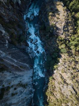 Aerial View of River flowing in canyon. Canadian Mountain Landscape, View from above. British Columbia, Canada. Nature Background