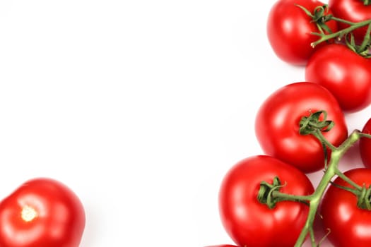 Red tomatoes on white background