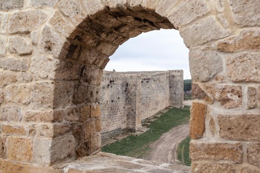 Derbent fortress Naryn Kala is the main touristic attraction in the city. Dagestan, North Caucasus, Russia. the city of Derbent in the distance, the blue sea and the sky.