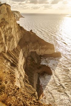 View of Logas Beach and the amazing rocky cliff in Peroulades. Corfu island. Greece.