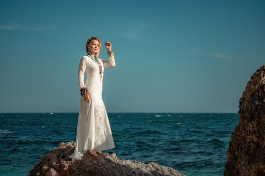 fashionable young model in boho style dress