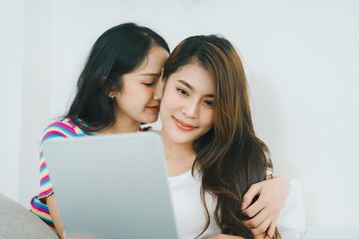 lgbtq, lgbt concept, homosexuality, portrait of two Asian women posing happy together and showing love for each other while being together.