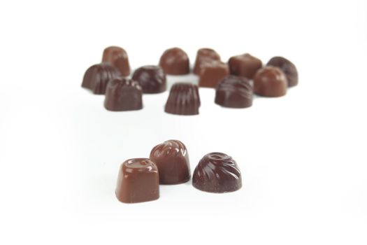 close up.set of chocolates isolated on white.photo with copy space.