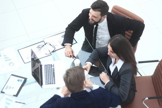 business team analyzes financial data.