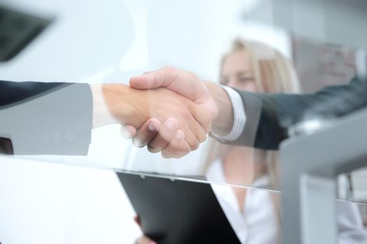 bottom view.closeup handshake financial partners