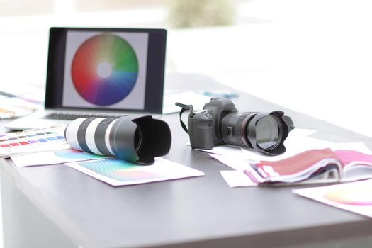 closeup.the camera and sketches on the Desk of the designer .the concept of creativity