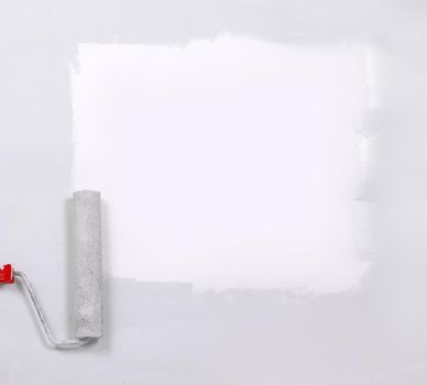 square painted white with the paint roller, on a white sheet of paper.place for text.
