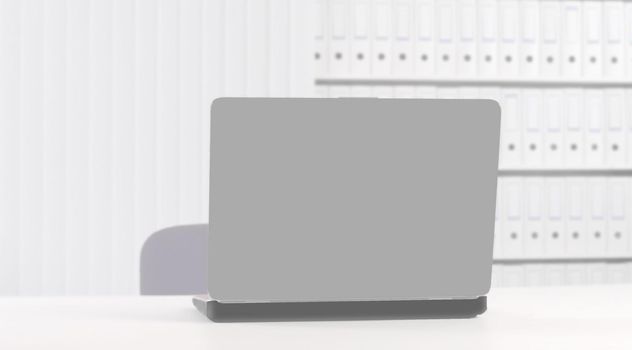 open laptop on the Desk from a businessman. photo with copy space.