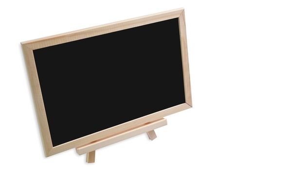 Empty blackboard on easel isolated on white background. Ready for your business.