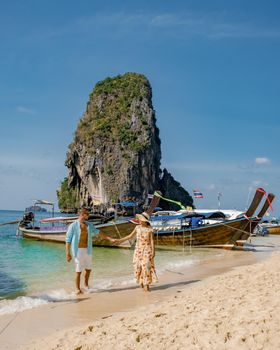 Couple of men and women on vacation in Southern Thailand. happy couple travel trough Thailand