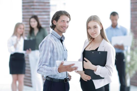 business colleagues looking at digital tablet screen .photo with copy space