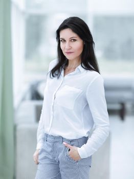 modern business woman on blurred background office.photo with copy space