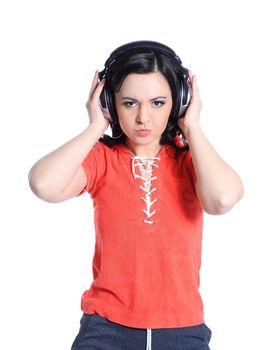 young woman listening to music using headphones.