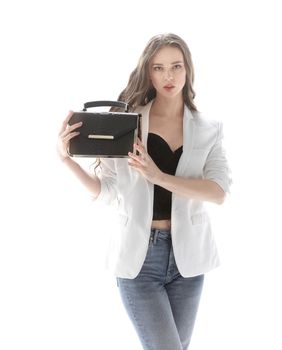 stylish young woman showing her fashionable handbag.isolated on white.