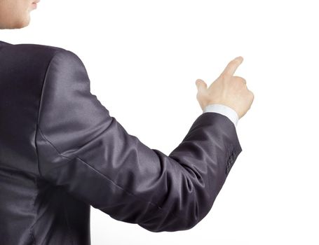 rear view. hand of a businessman pointing at a copy space.