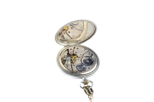 Vintage pocket watches with open back cap, isolated on a white background 