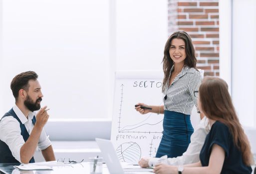 young businesswoman discusses financial data with colleagues.photo with copy space