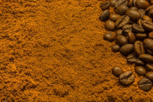 Background with coffee beans and ground coffee