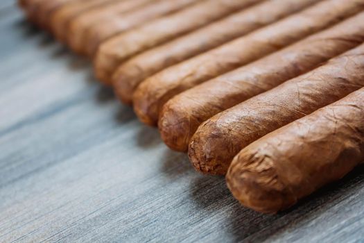 Cigars on the wooden background