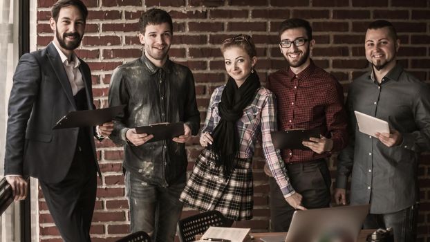 successful business team near the workplace in modern office
