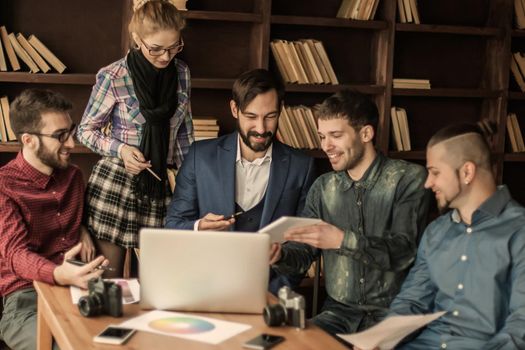 business team discussing a new advertising project of the company in a modern office