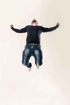 concept of victory - the sports guy - bodybuilder is happy with his new achievements.the photo has a empty space for your text