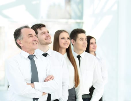 successful business team looking at copy space.business background