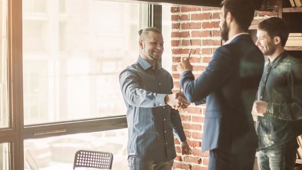 handshake when meeting the Manager and the client in the office