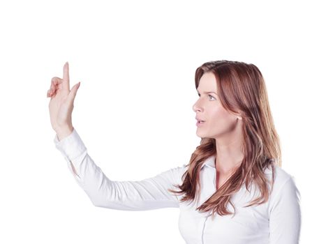 modern successful business woman presses on a virtual button.isolated in the dark.photo with place for text
