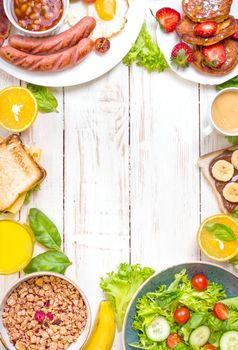 Assortment of breakfast choices. English breakfast, sausages, fried eggs, bacon, salad, granola, cheese sandwich, pancakes, chocolate cream and banana toast, coffee, fresh orange juice. Space for text