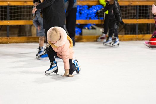 girl skating on the ice rink